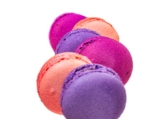 Macaroon delicate and airy desserts on a white background.