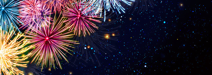 Colorful firework on night sky.New Year background.