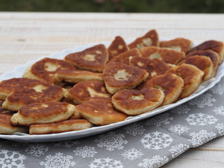 cupcake fried pastries on a wooden rustic table
