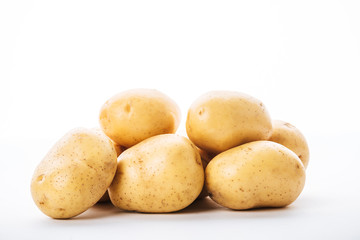 Fototapeta na wymiar organic raw potatoes on white background