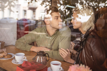Couple discussing their plans in the cafe