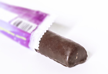 chocolate bar in open wrap