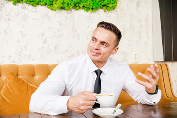Businessman drinking a cup of coffee