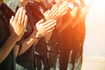 Soldiers are praying.