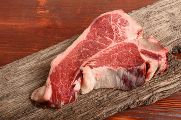 raw tbone steak for blessing day and christmas holidays. A piece of fresh organic farm meat