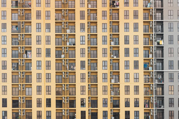 Close up view of high condominium apartment building in Thailand with strong geometry and detail.