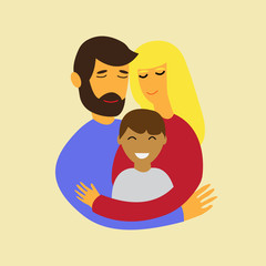 Adoptive family.Young happy couple hugging their adopted child.