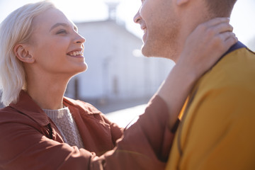 Cheerful couple having a desire to kiss