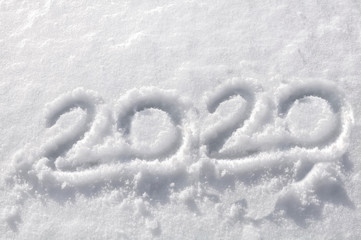 close on 2020 number handwritten in the snow