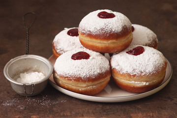 Jewish holiday hannukah symbols - donuts with jam