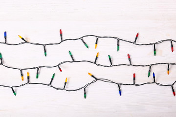 Christmas background concept. New year decoration lights, garland with many small lamps of...