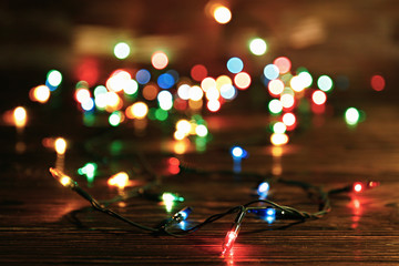 Christmas background concept. New year decoration lights, garland with many small lamps of...