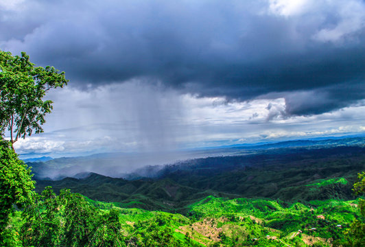 The Beautiful Shajek valley. One side of the mountain is raining and other side sunny. very rare photo .