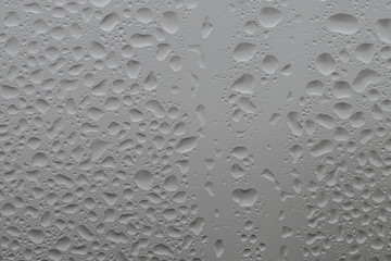 Texture of a drop of rain on the glass. Transparent background.