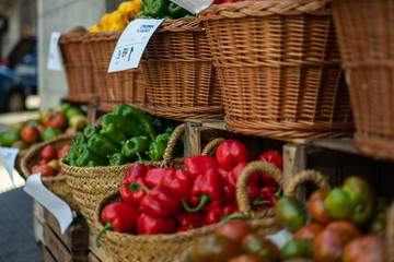 Farmers market with various domestic colorful fresh fruits and vegetable. Tasty colorful mix. Farmers market basket with raw fresh vegetables. Bio, healthy food. Freshly, seasonal harvested.