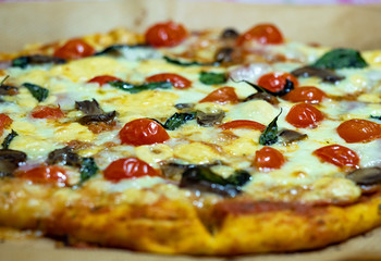 blurred pattern of homemade pizza. Italian traditional dish on a thin dough with a variety of fillings