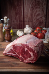 thick cut raw beef eibeye with bone for roast