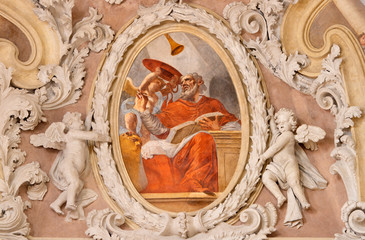 RIVA DEL GARDA, ITALY - JUNE 13, 2019: The baroque fresco of St. Jerome doctor of the west catholic church in church Chiesa di Santa Maria Assunta  by Teofilo Polacco from beginn of 19. cent..