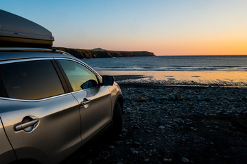 View of car parked on beach