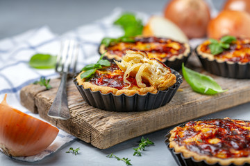 Delicious homemade mini pies with onions. © Saprunova Marina