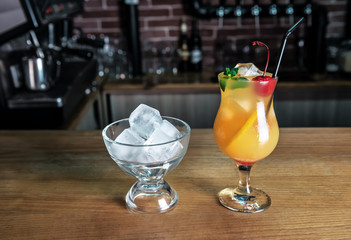 orange cocktail with ice