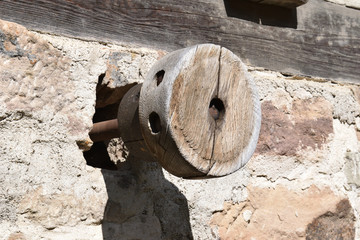 Old Wooden Wheel Hub attached to Wall 6995-042