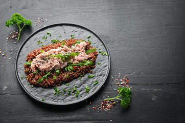 Quinoa with tuna and chia seeds. Superfood. Healthy food. Top view. Free space for your text.