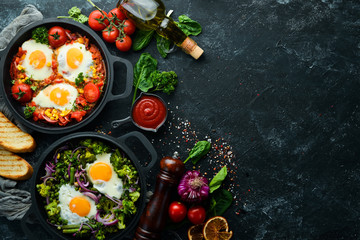 Homemade breakfast shakshuka of fried eggs. Arabic traditional cuisine. Top view. Free space for your text.