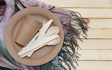Fototapeta na wymiar Eco paper plate fork on old wooden table