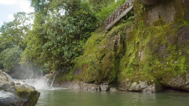 Fat Scared Pirate Jumping From A Hillside To The River