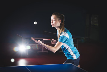 Table tennis, female player with racket and ball
