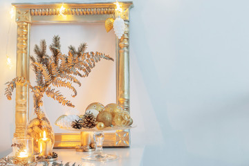 Christmas golden decor in white interior
