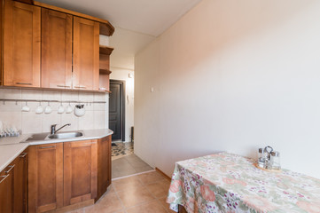 Russia, Moscow- July 06, 2019: interior room apartment. standard repair decoration in hostel. modern kitchen, dining area