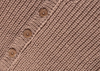 Knit texture with a button.