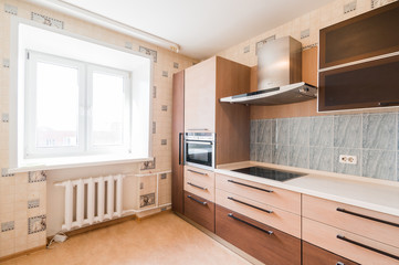 Russia, Moscow- July 06, 2019: interior room apartment. standard repair decoration in hostel. kitchen and dining room