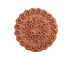 brown chocolate round cookies in a stack isolated on white background