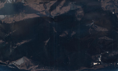 dark polyethylene texture with scratches and bumps