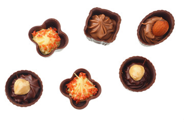 Chocolate pralines isolated on a white background. top view