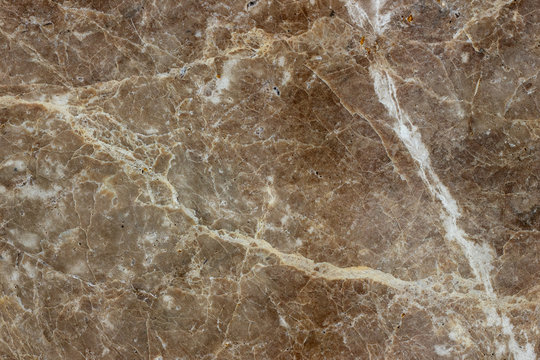 White gray brown cracked marble background.