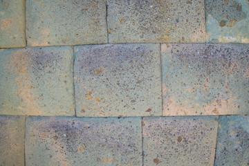 Obraz premium Close up of an Incan wall, made of squared stones perfectly smoothed and wedged one to each other