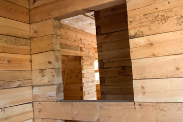 Details and elements of wooden house made of timber. The constru