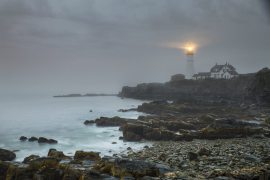 Lighthouse In Heavy Fog