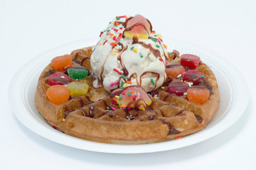 Waffles with ice cream, toping flavors and chantilly cream