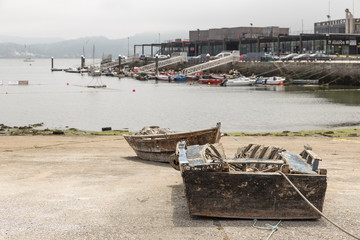 Puerto de Combarro, two boats in the foreground very shattered, Galicia, Spain
