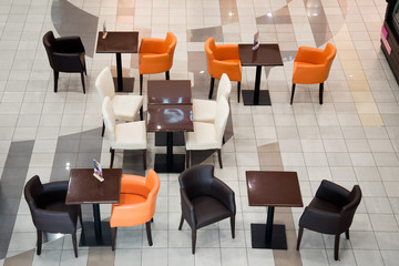 Empty chairs and tables in the cafe. The view from the top. There were no visitors. There is no trade. Bad traffic. Bankrupt.