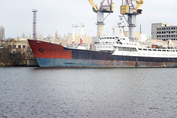Naklejka premium Shipbuilding of the last century, old bay with ships