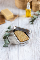 Natural bathroom product, handcrafted soap in soap holder, vertical