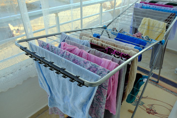drying clothes on the laundry hanger on the balcony,