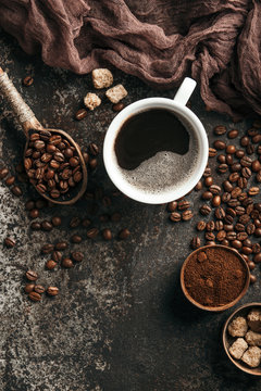 Coffee Board With Coffee Beans On Dark Textured Background.