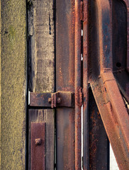 metal and wood sandwiched together 